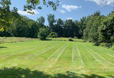 Completed field mowing services in CT